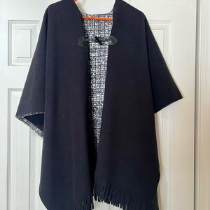 Women’s black reversible fringe cape